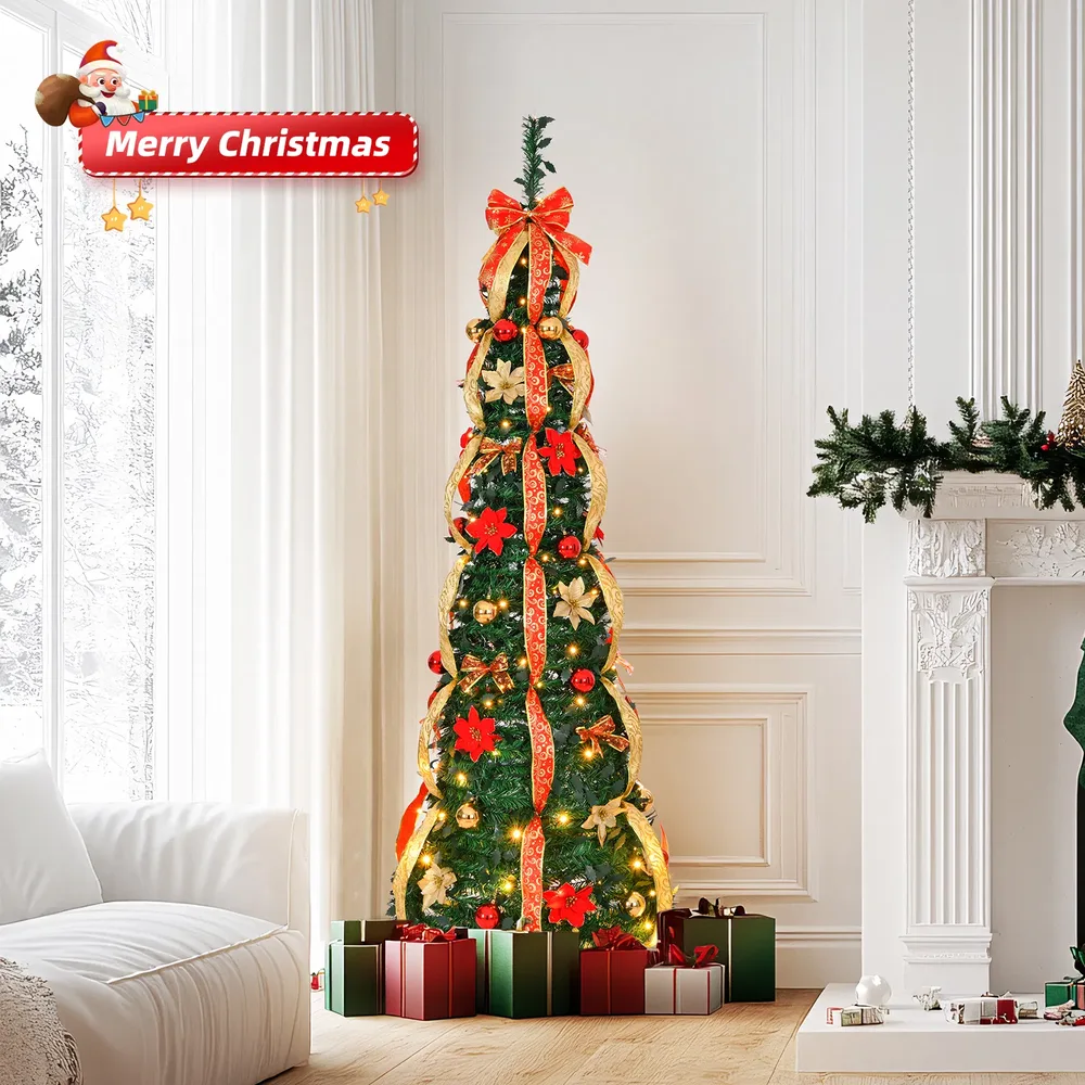 Decorated red and gold pop-up Christmas tree in a bright living room next to a fireplace